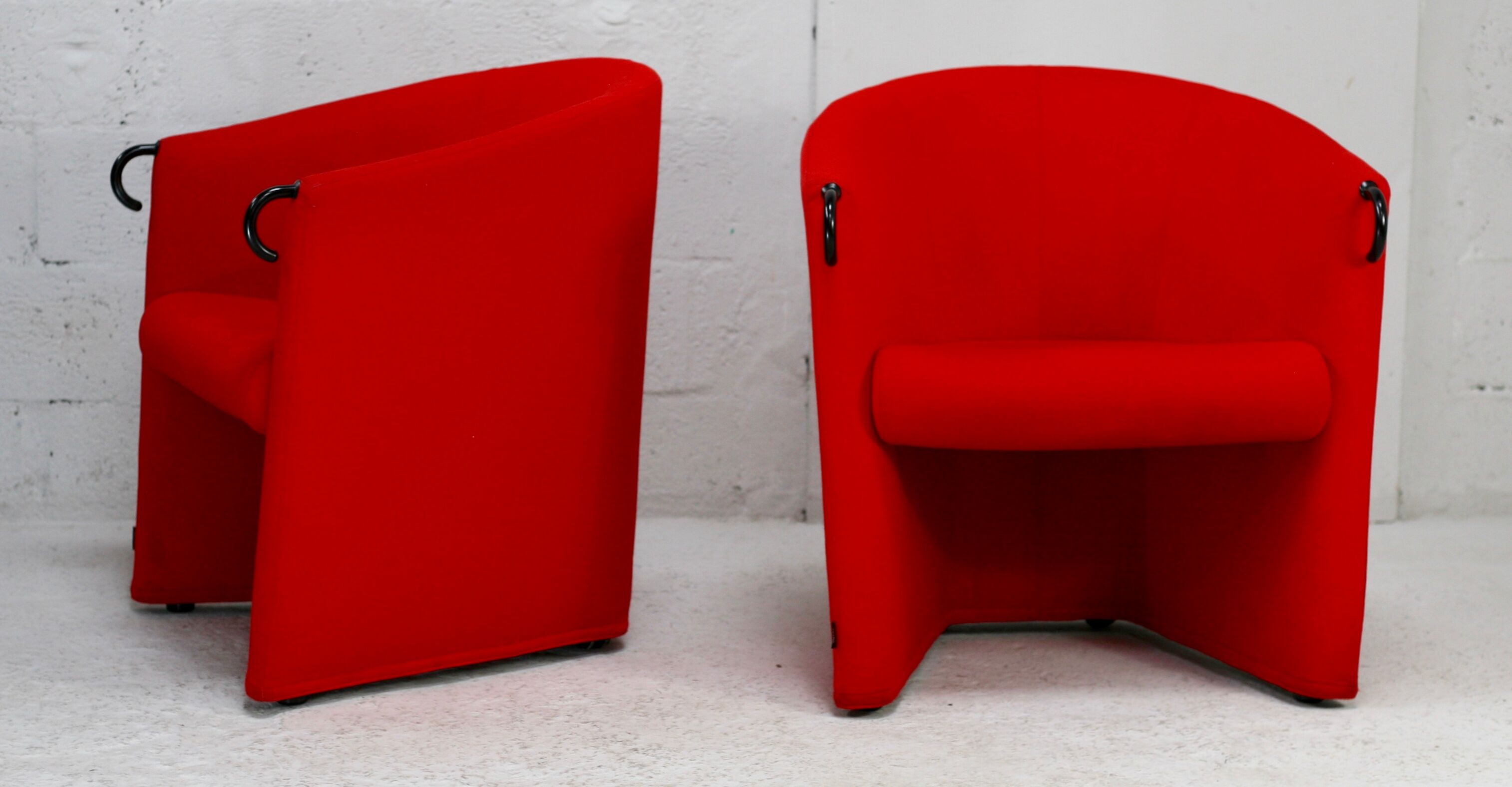 Pair of red Arflex armchairs. Italy, circa 1980