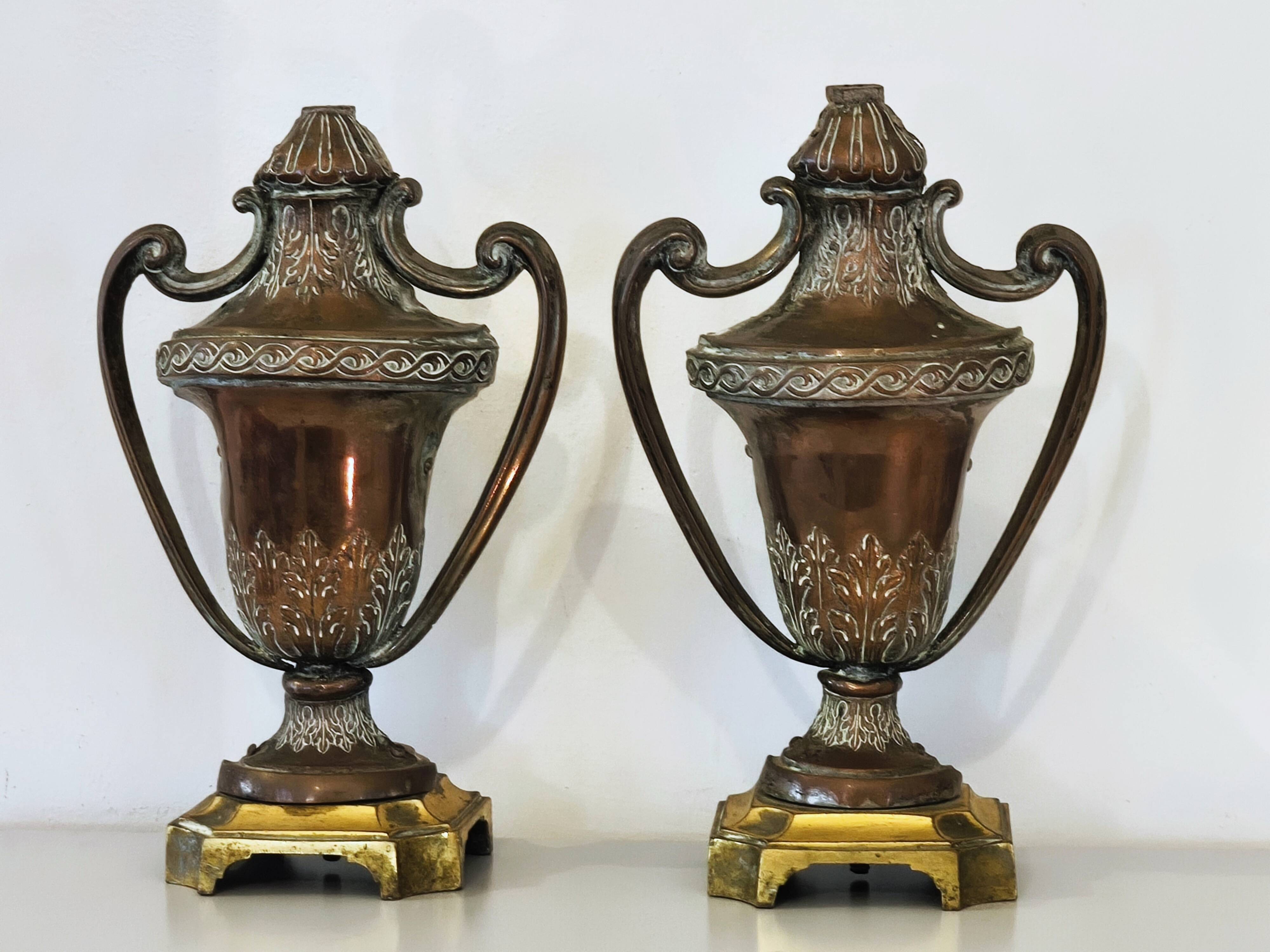 Pair of solid wood and bronze door handles, classical style, Italy 20th century.