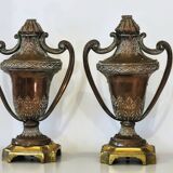 Pair of solid wood and bronze door handles, classical style, Italy 20th century.