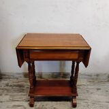 Small wooden drop-leaf table