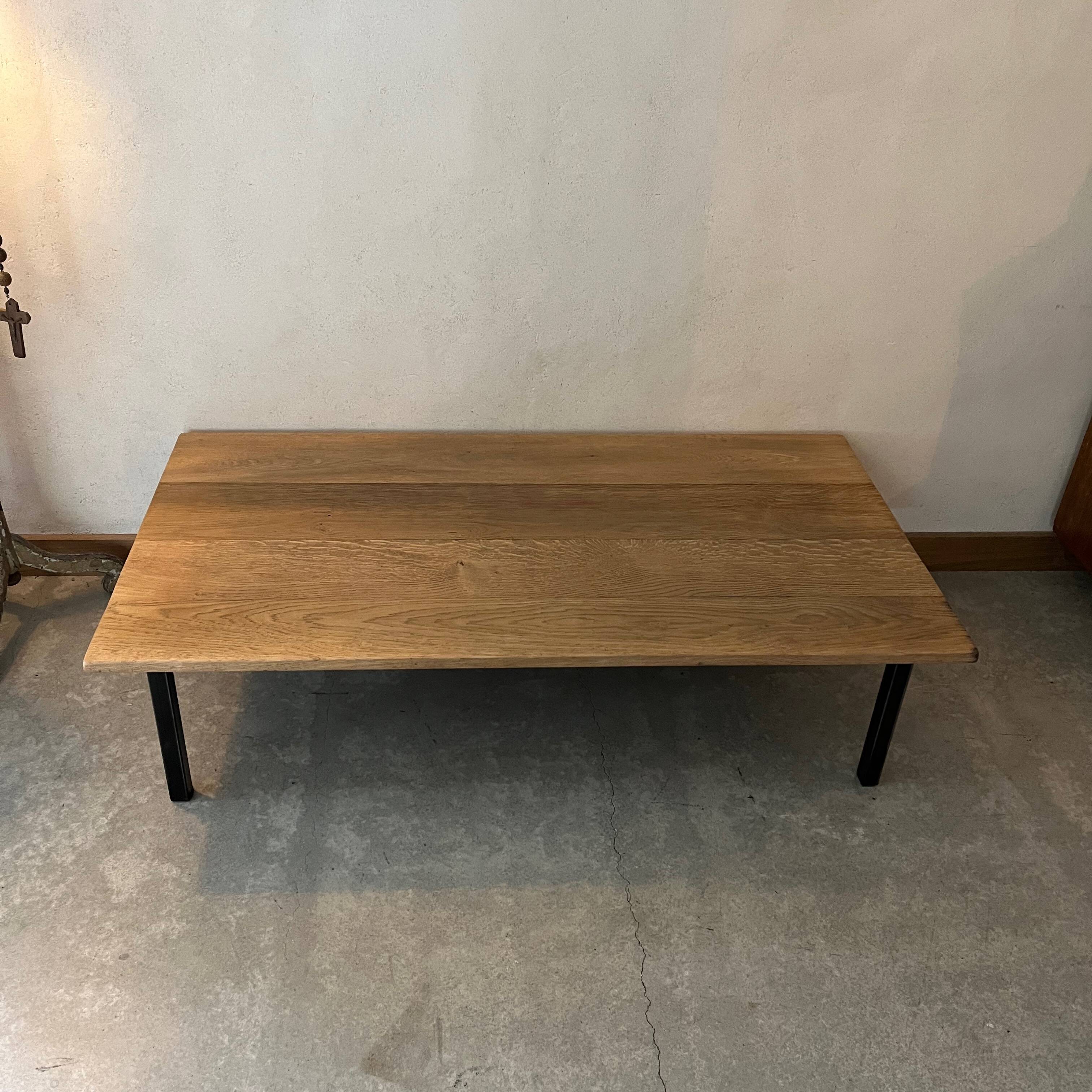 Wooden coffee table with metal legs