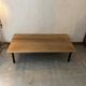 Wooden coffee table with metal legs