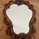 Carved wooden mirror