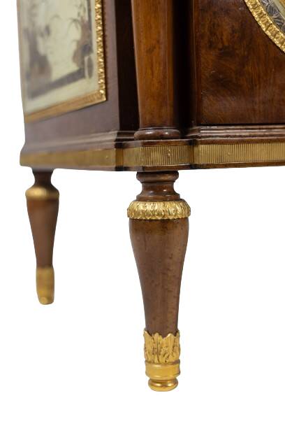 Empire style chest of drawers in lacquer, bronze and marble. Nineteenth century.