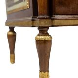 Empire style chest of drawers in lacquer, bronze and marble. Nineteenth century.