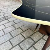 Black glass and wood coffee table