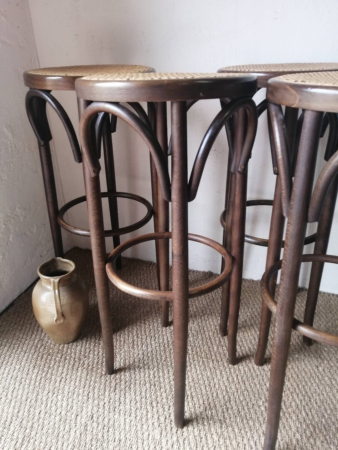 Set of 4 high bistro stools in curved wood and canework.