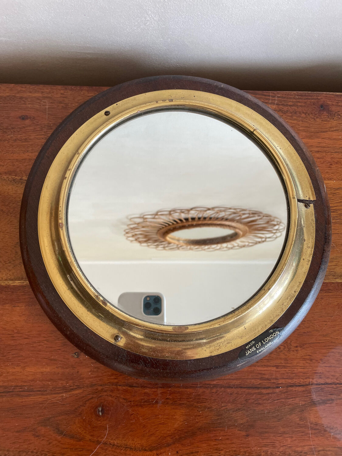 Wood and brass mirror