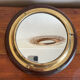 Wood and brass mirror