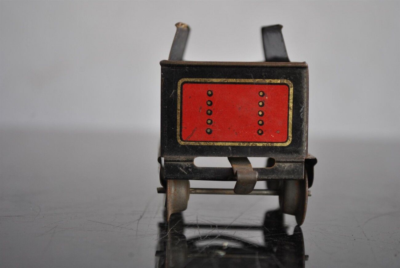 Tin litho brand LR spring-loaded toy locomotive