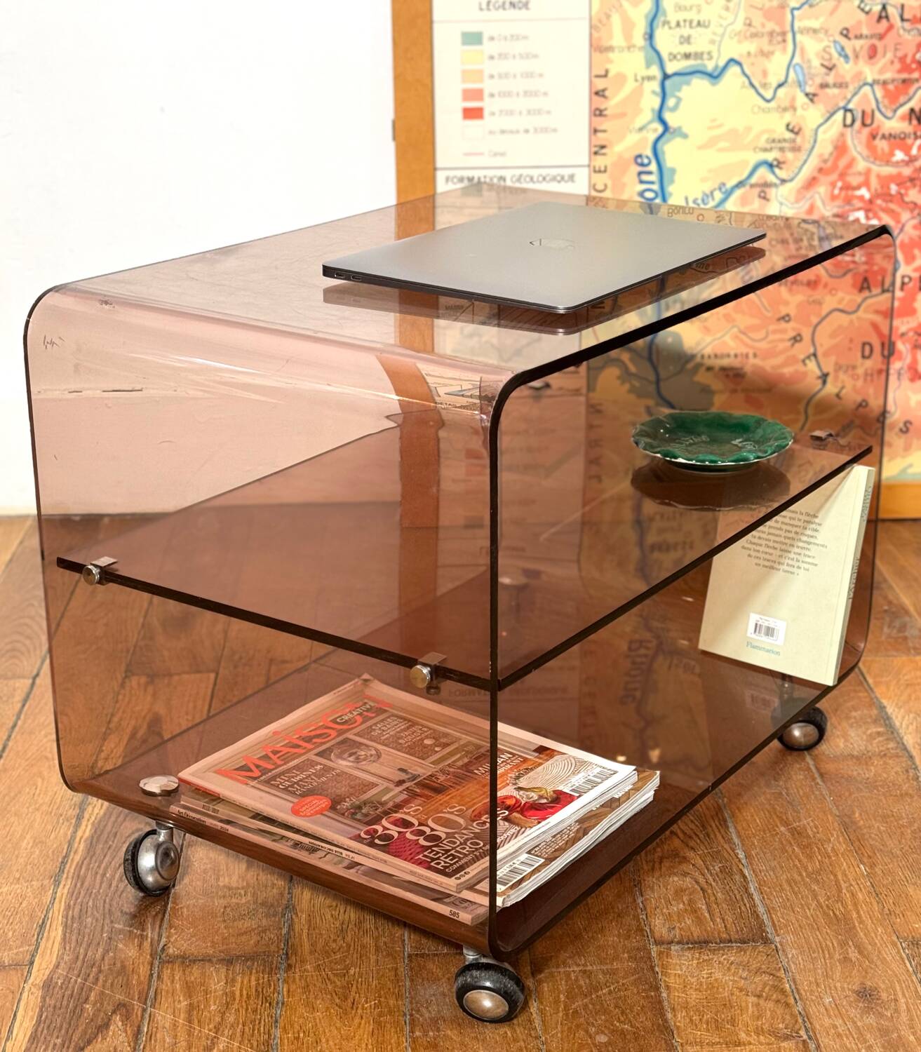 Smoked Plexiglas coffee table on wheels -