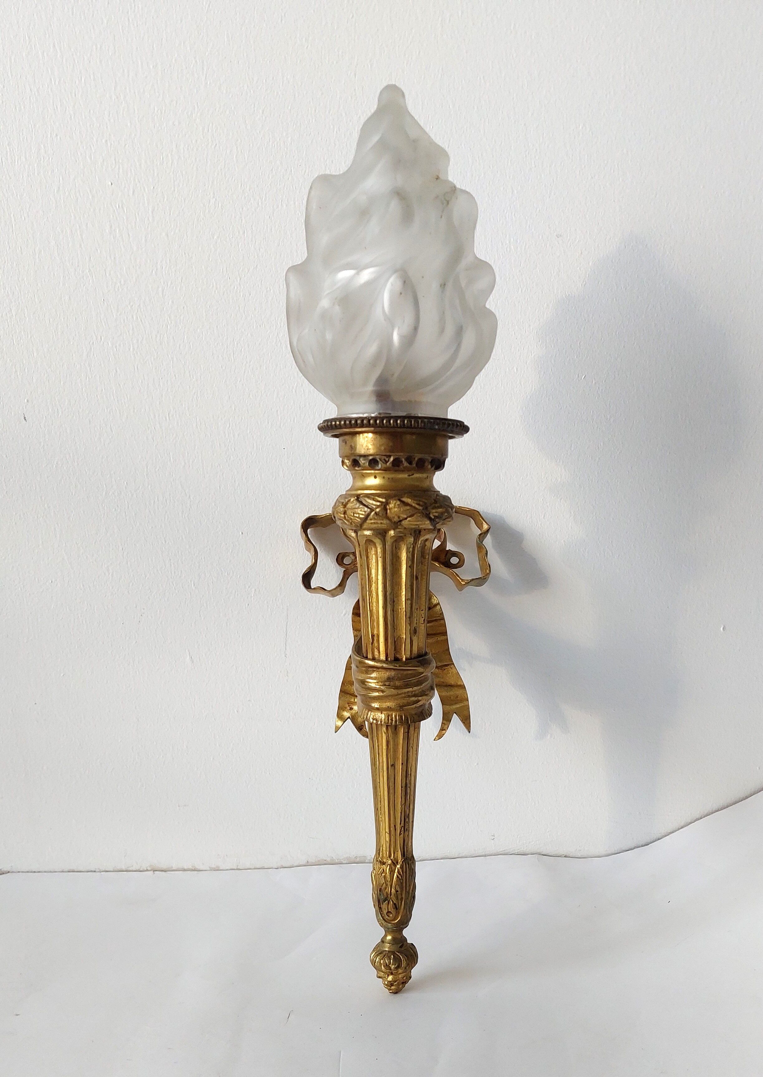 Torch wall lamp in gilded bronze Louis XVI Circa Napoleon III style.