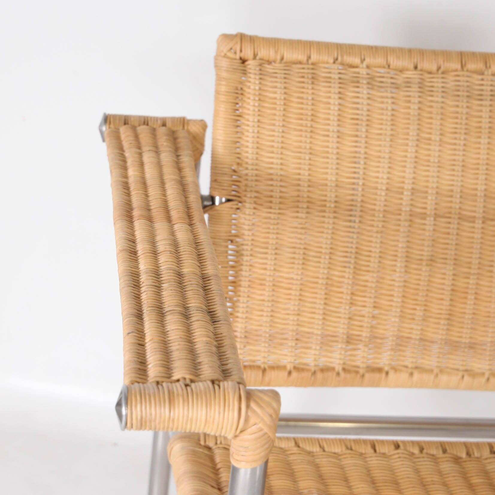 Pair of wicker and chrome armchairs