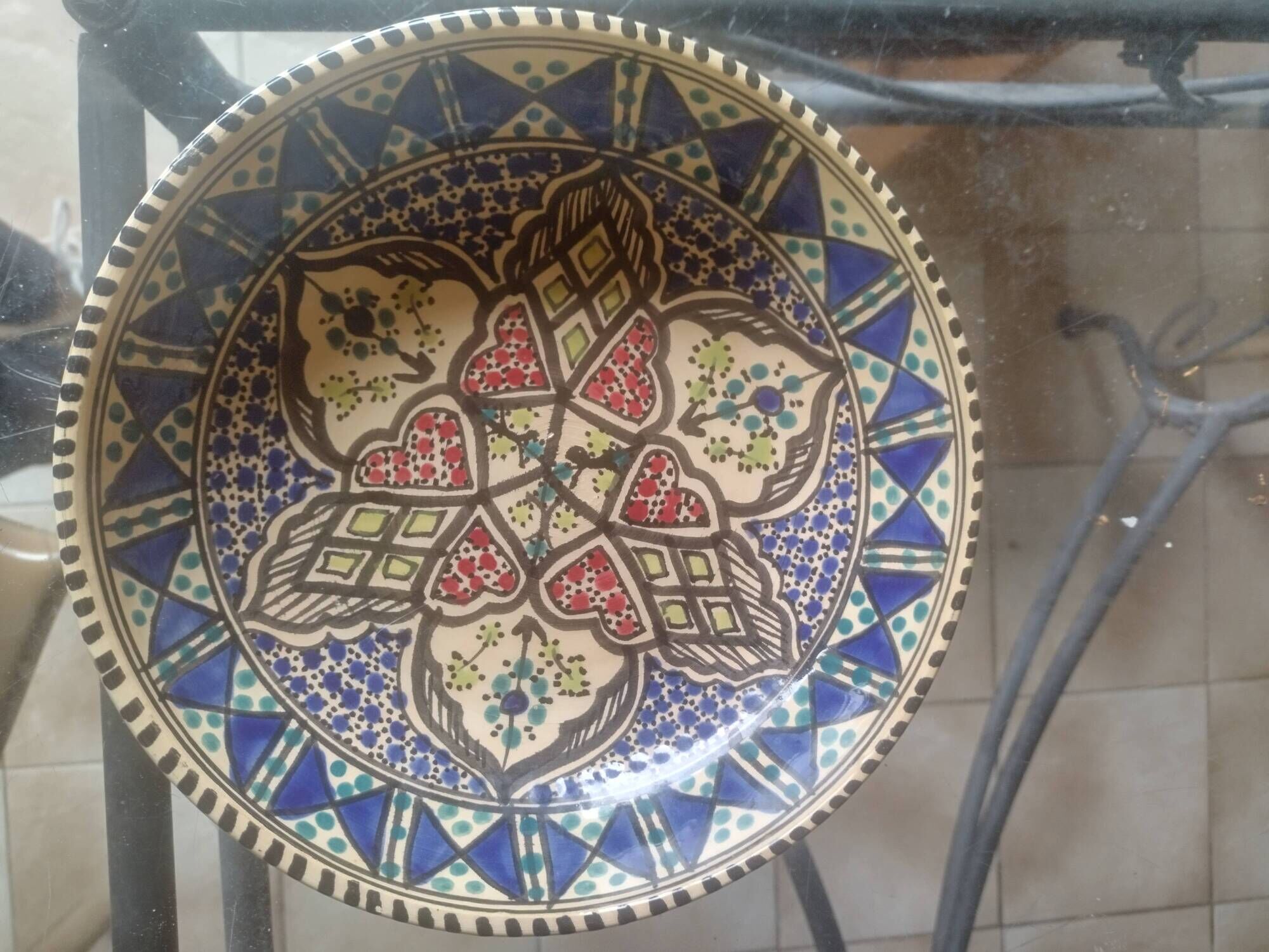 Antique Tunisian ceramic plate, signed and numbered.