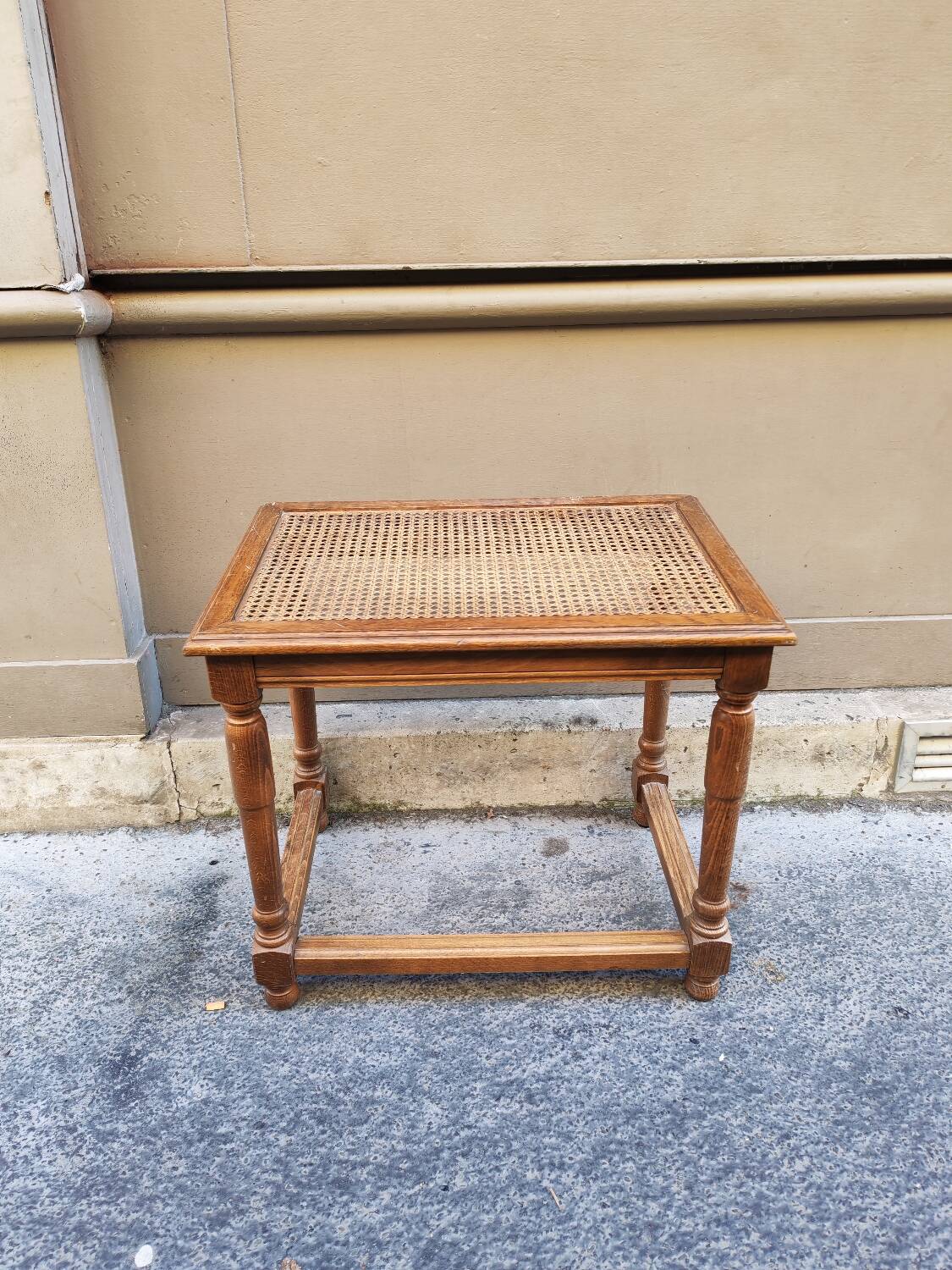 Wooden bench with caning