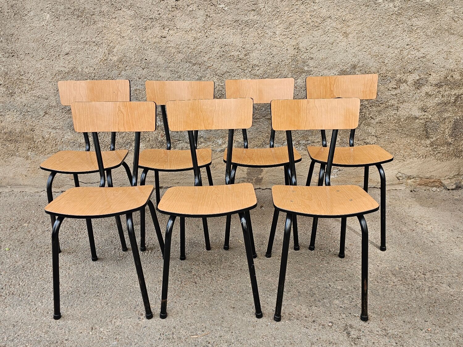 Chairs in black and light brown formica