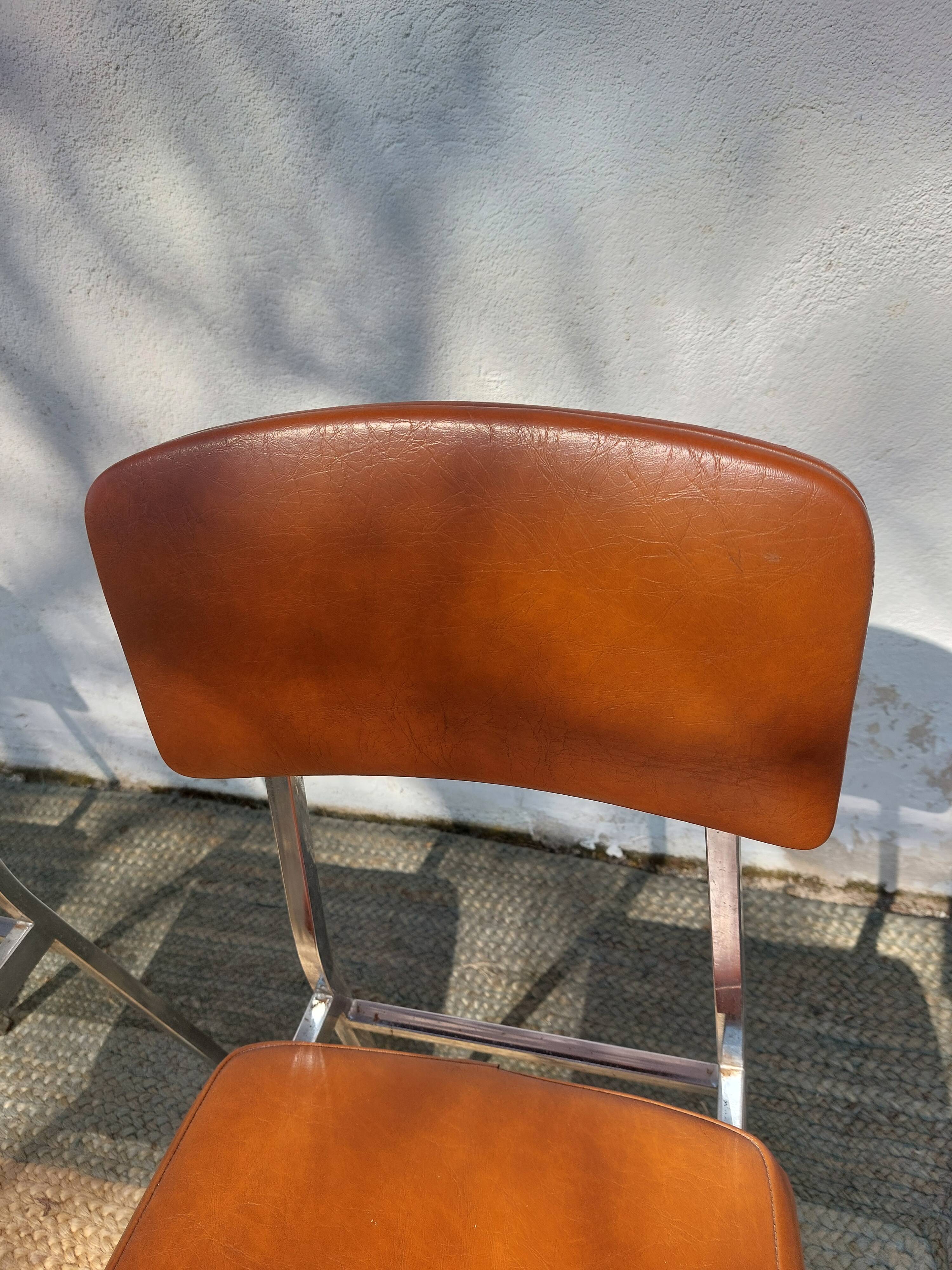 3 stainless steel tube chairs and faux leather, vintage