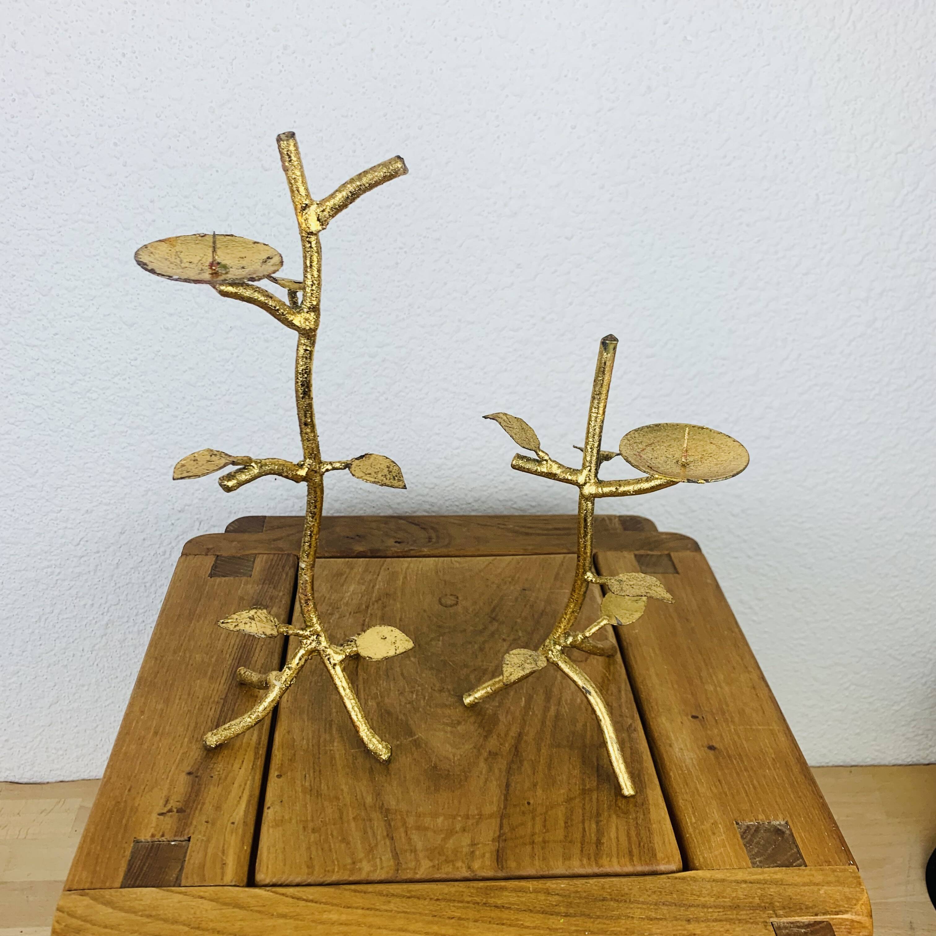 Pair of golden foliage candlesticks