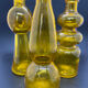 Set of 3 yellow corrugated glass vases
