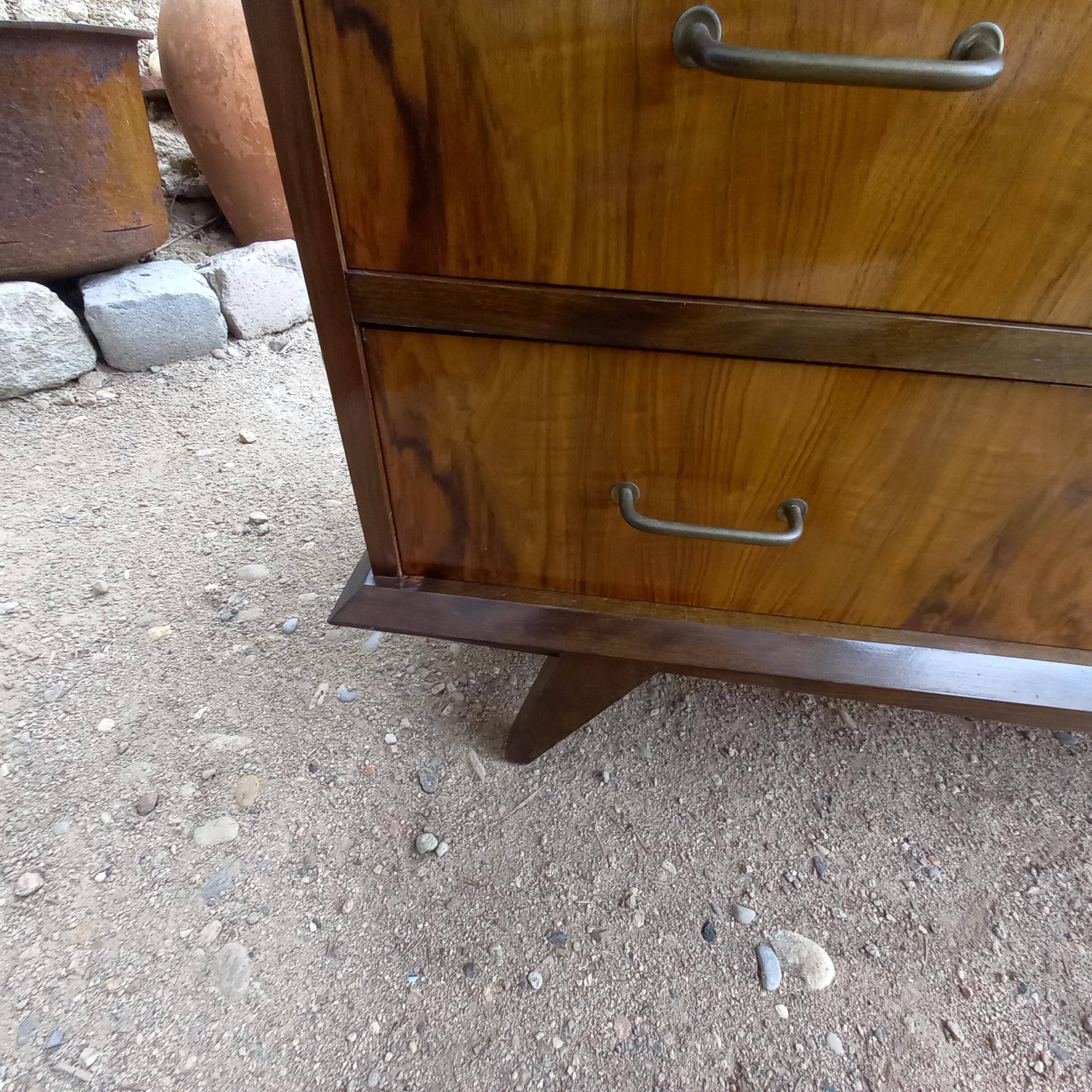 Rosewood chest of drawers with compass feet