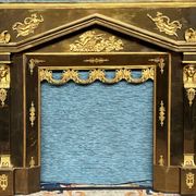 Empire-style fireplace decoration.