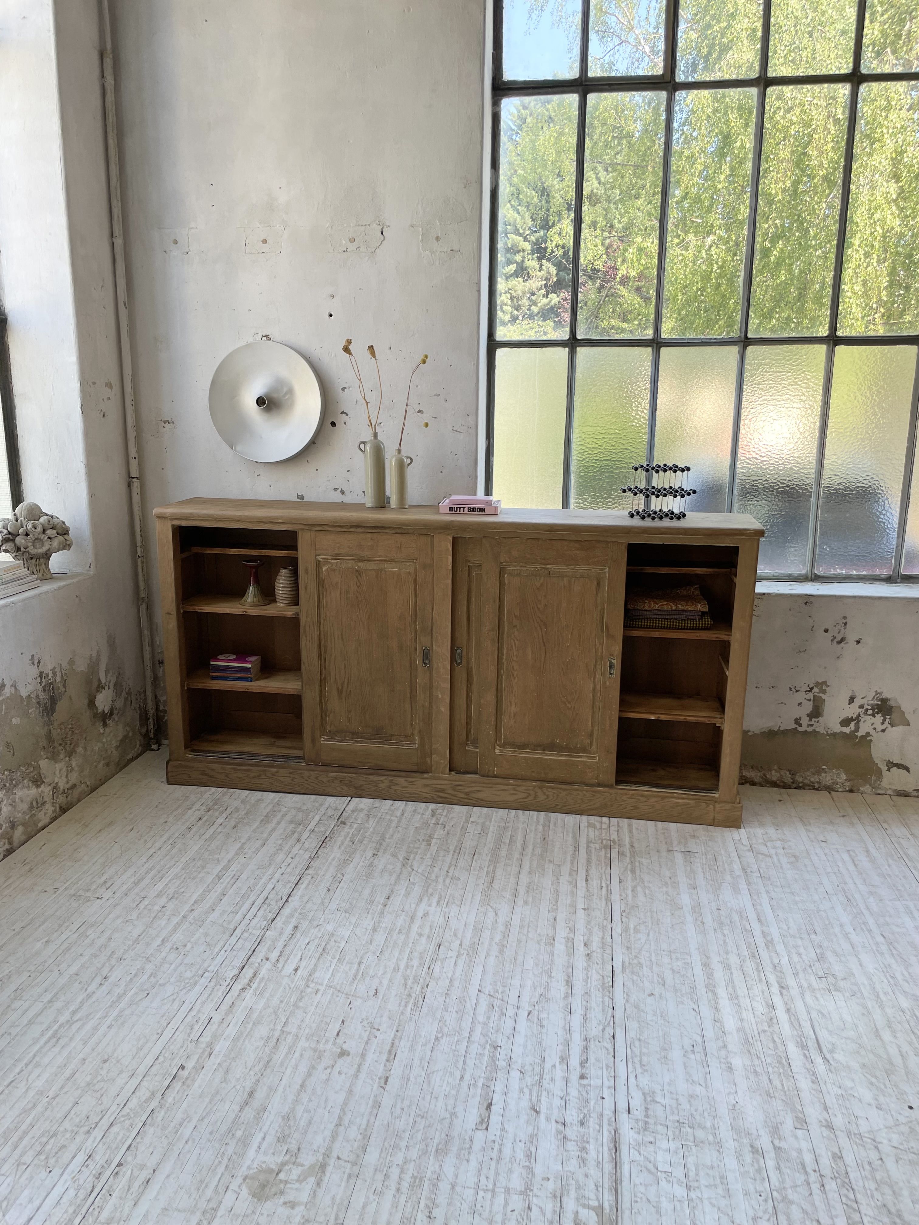 Large row of solid oak loom sliding doors