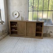 Large row of solid oak loom sliding doors