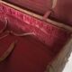 suitcase of leather with labels of palaces