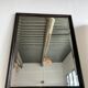 Rectangular mirror in molded blackened wood, beveled glass