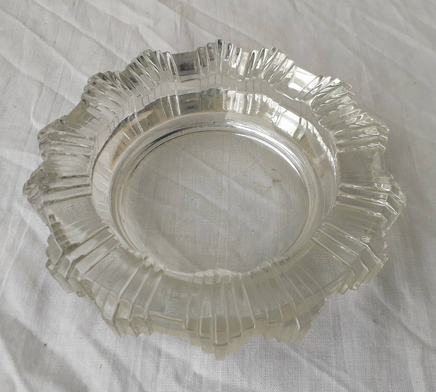 Ashtray or glass catchall.