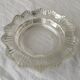 Ashtray or glass catchall.