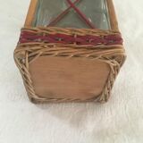 Bottle sheathed on the top and the low d wicker woven