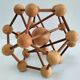 Sculptural modeling of a solid wood atom contemporary design