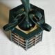 Wrought iron wall lantern & amber cathedral glass