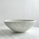 Openwork porcelain fruit bowl.
