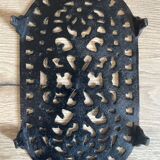 Dessous de plat en fonte