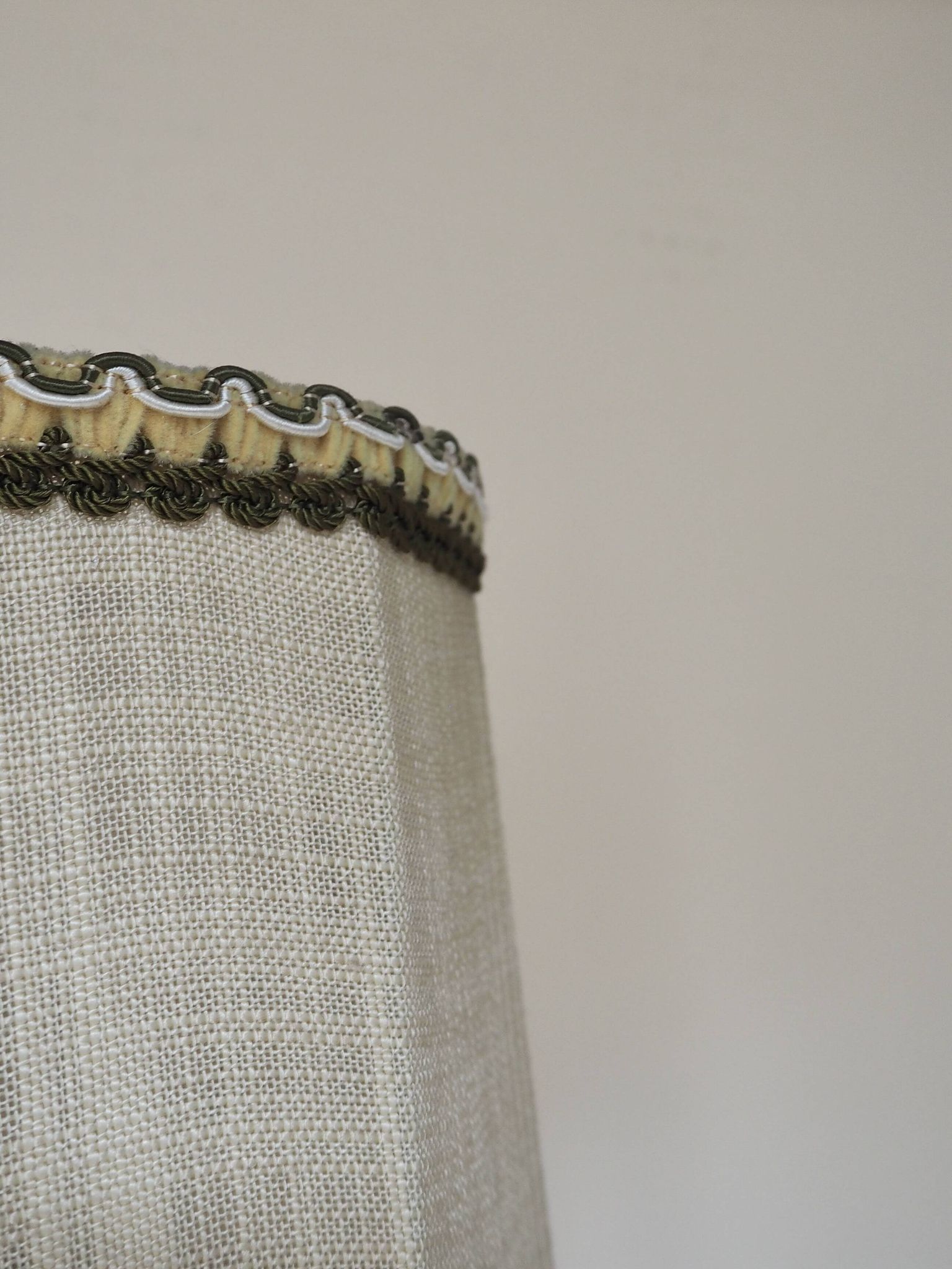 Turned wooden lamp with linen shade