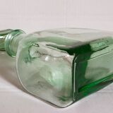 Vintage green glass whiskey decanter