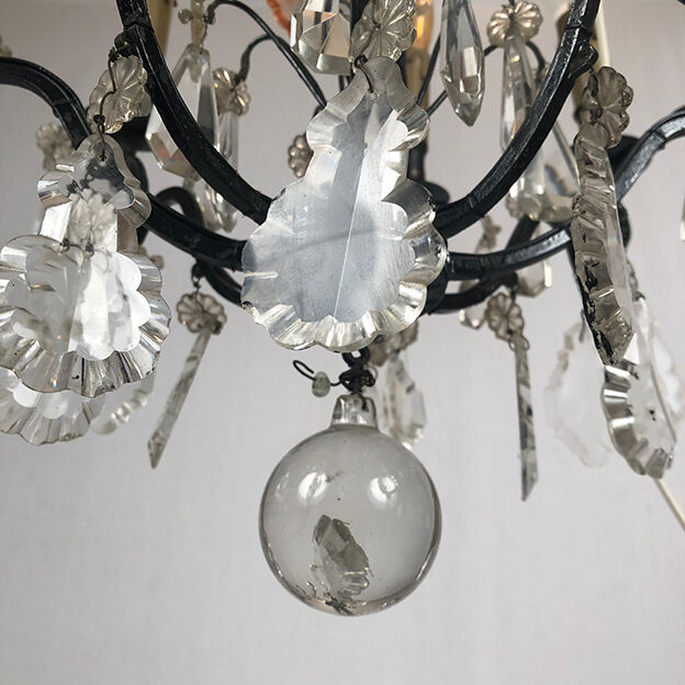 Black lacquered metal chandelier and crystal tassels