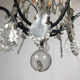 Black lacquered metal chandelier and crystal tassels