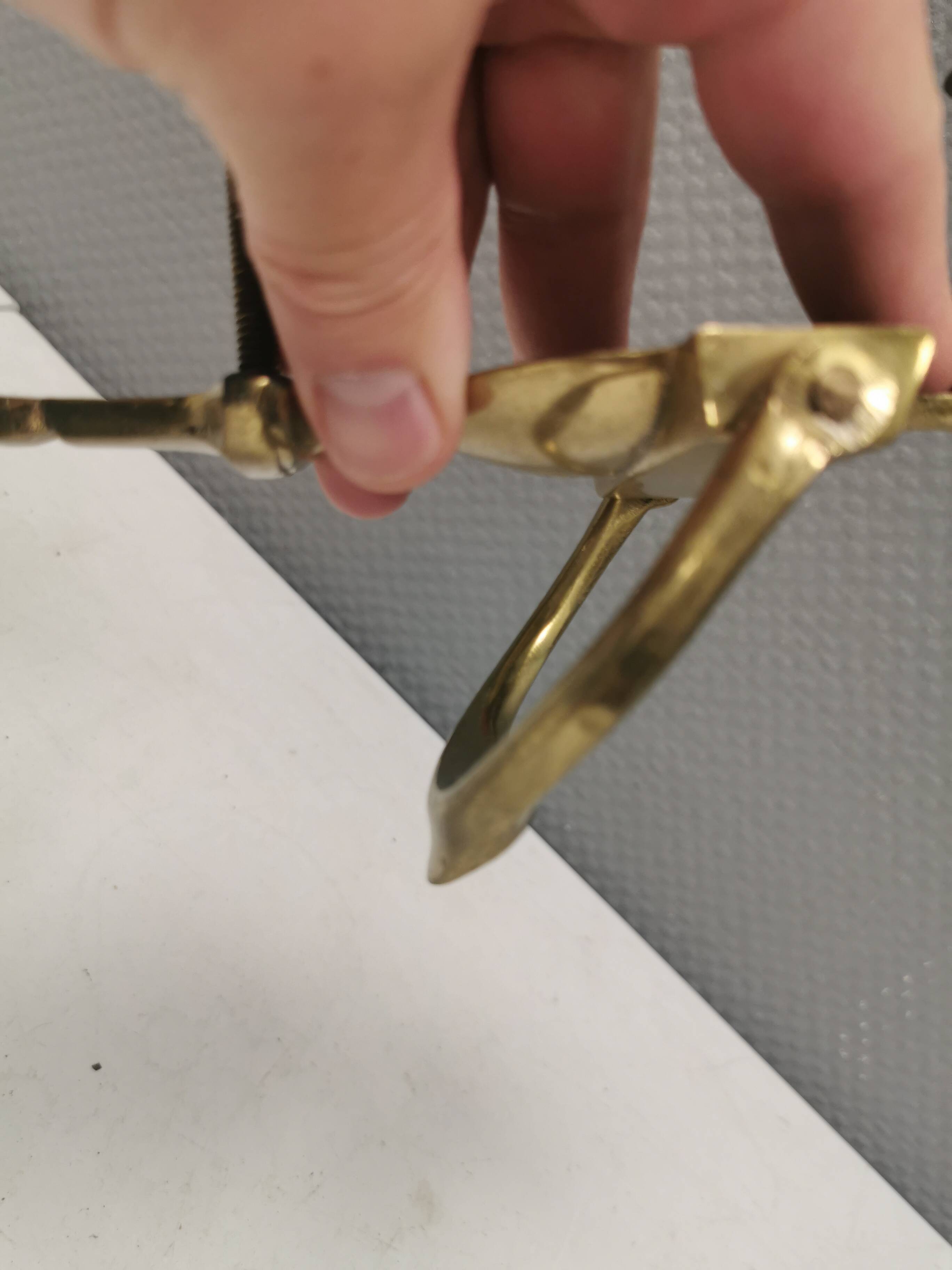 Old door hammer in solid brass. Estimated 1960s.