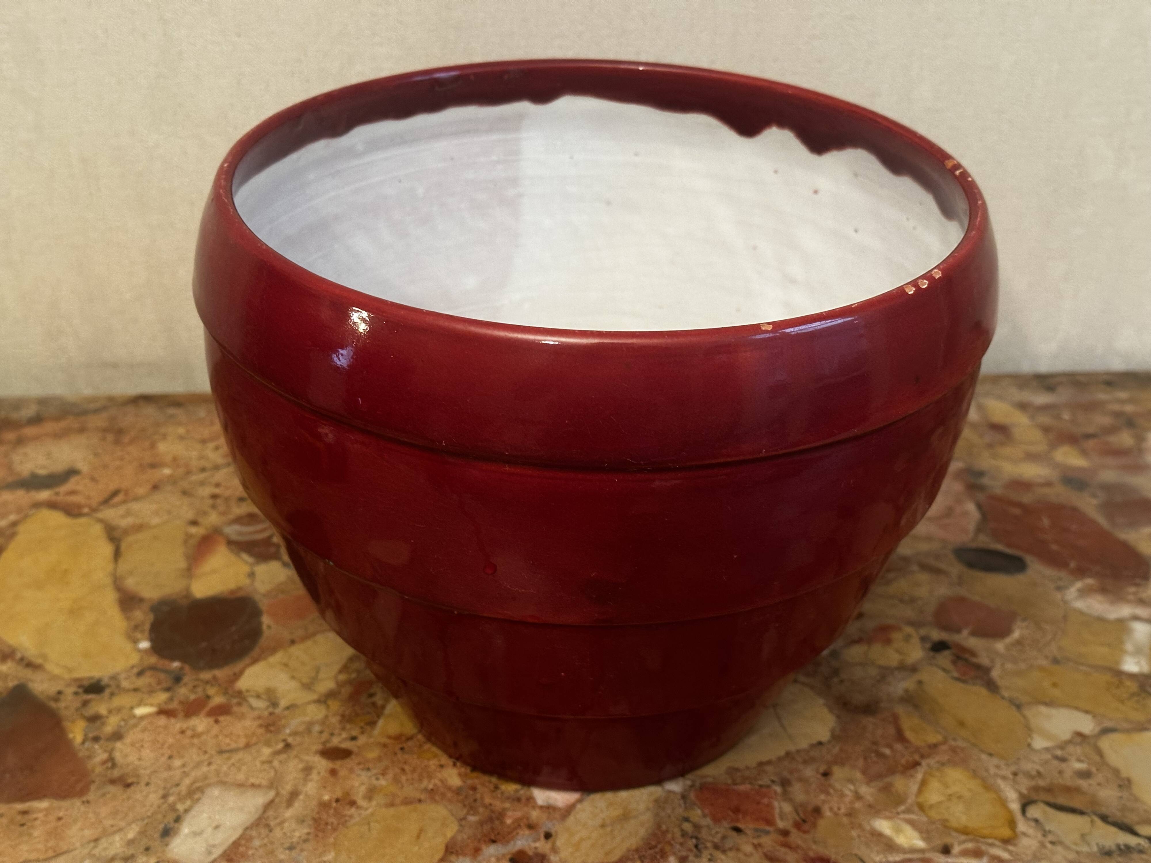 Burgundy glazed ceramic planter