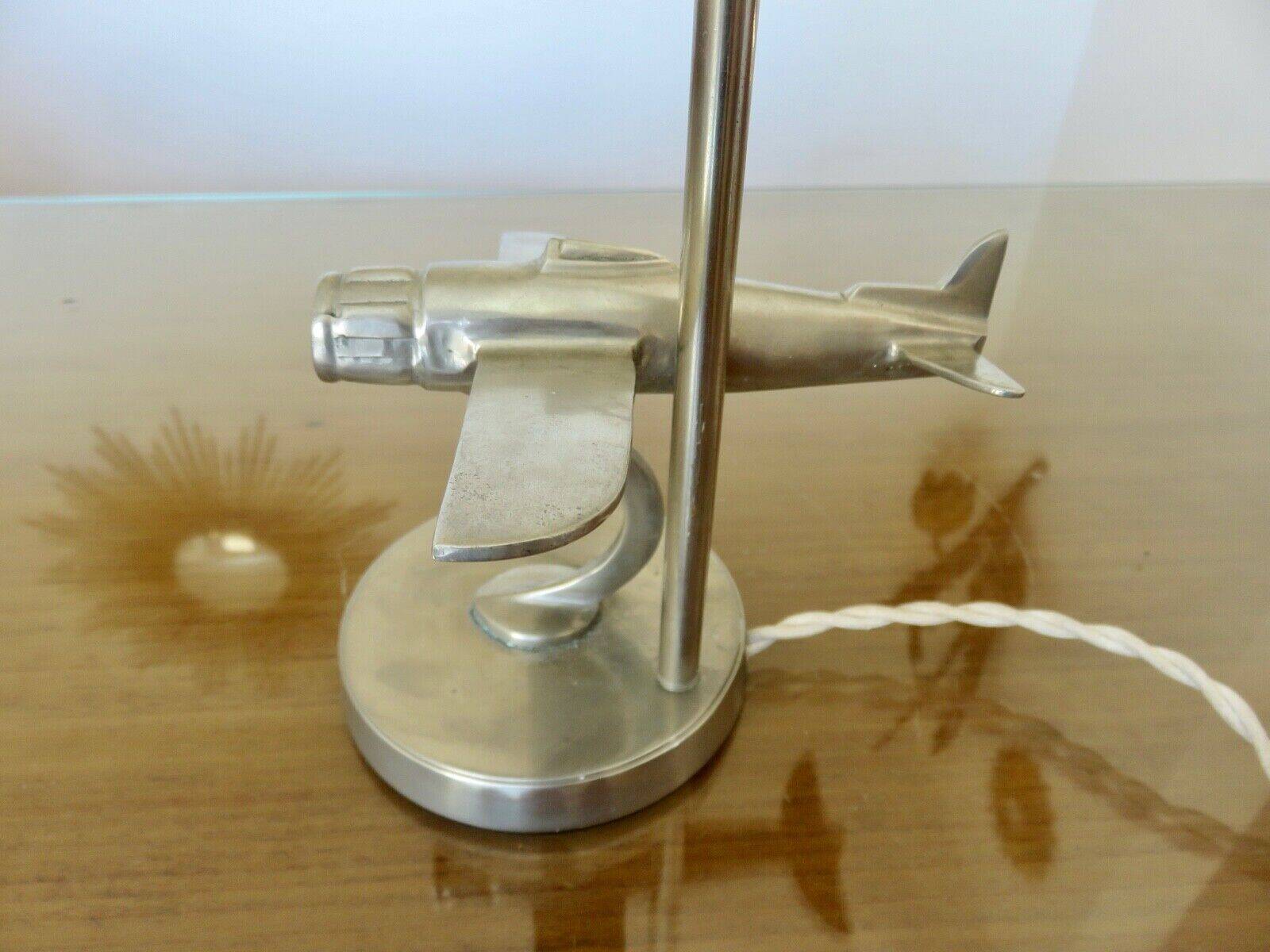 “Airplane” lamp in nickel-plated brass from the 40s and 50s