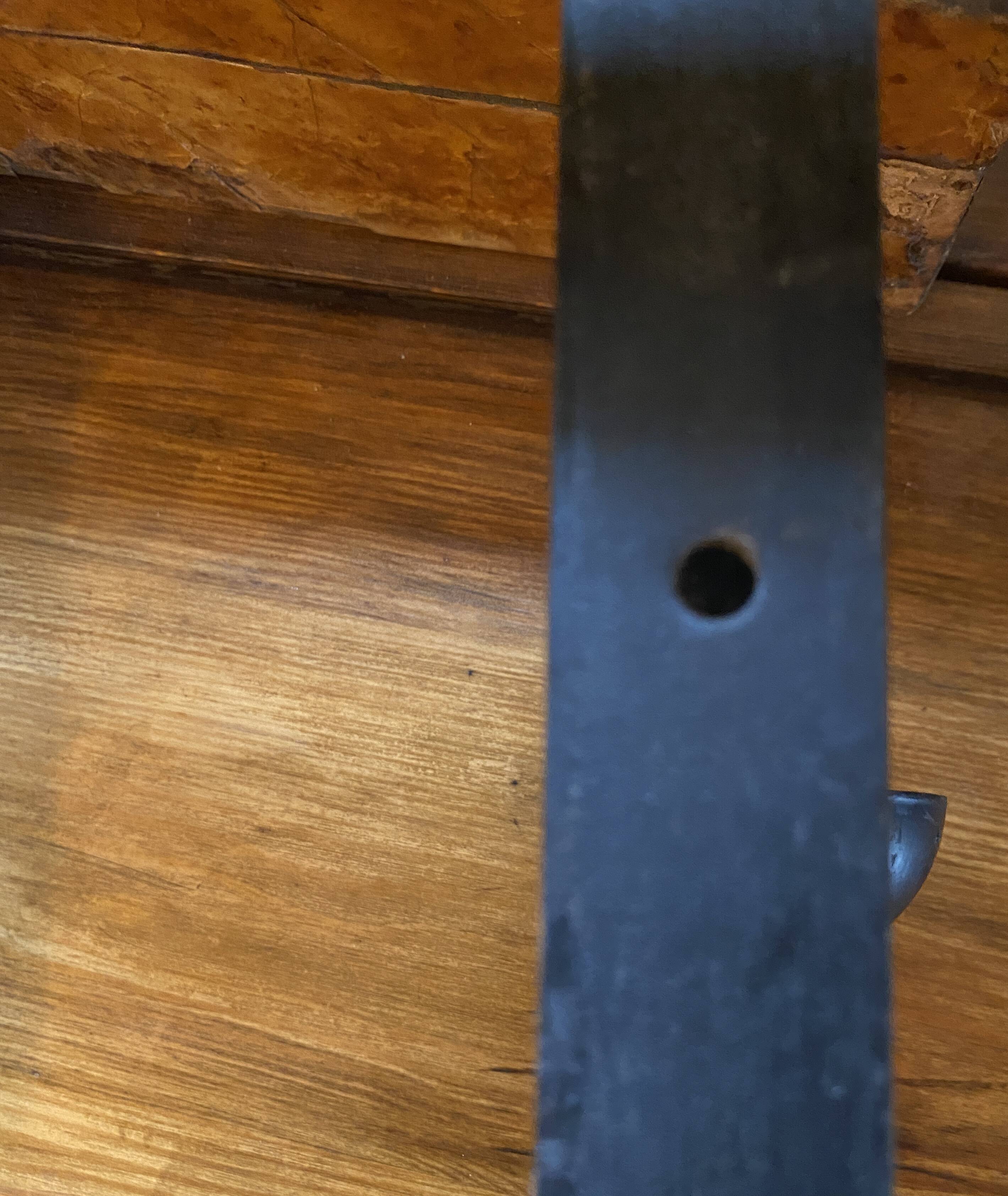 Wrought iron wall light, fabric cable