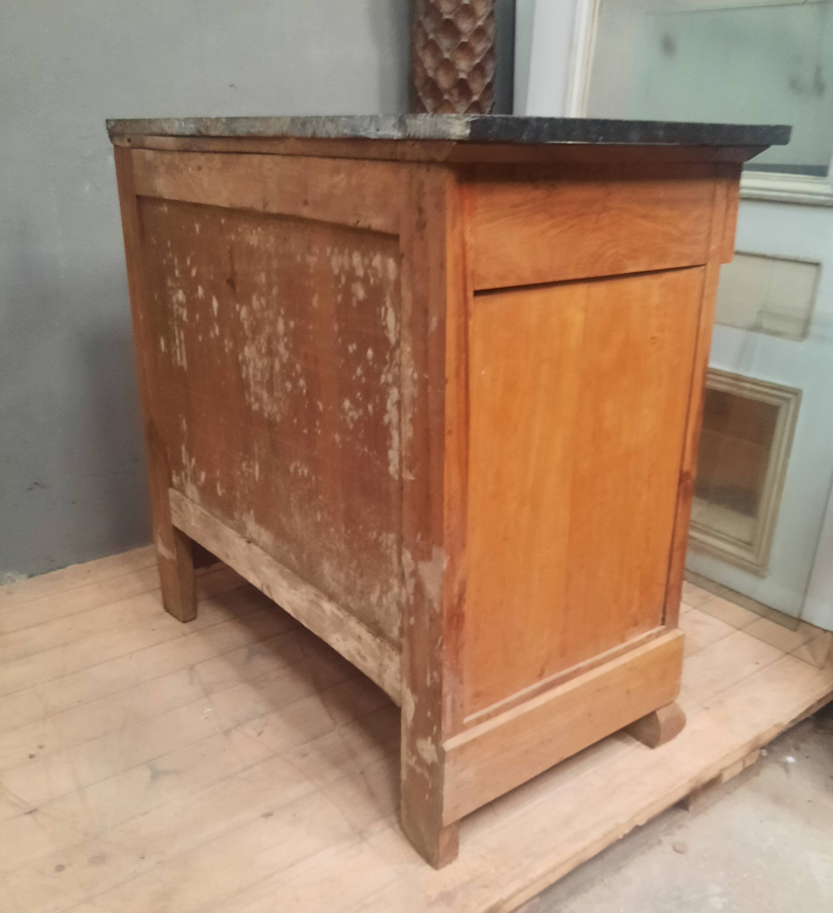 Nineteenth-century commode with marble top.