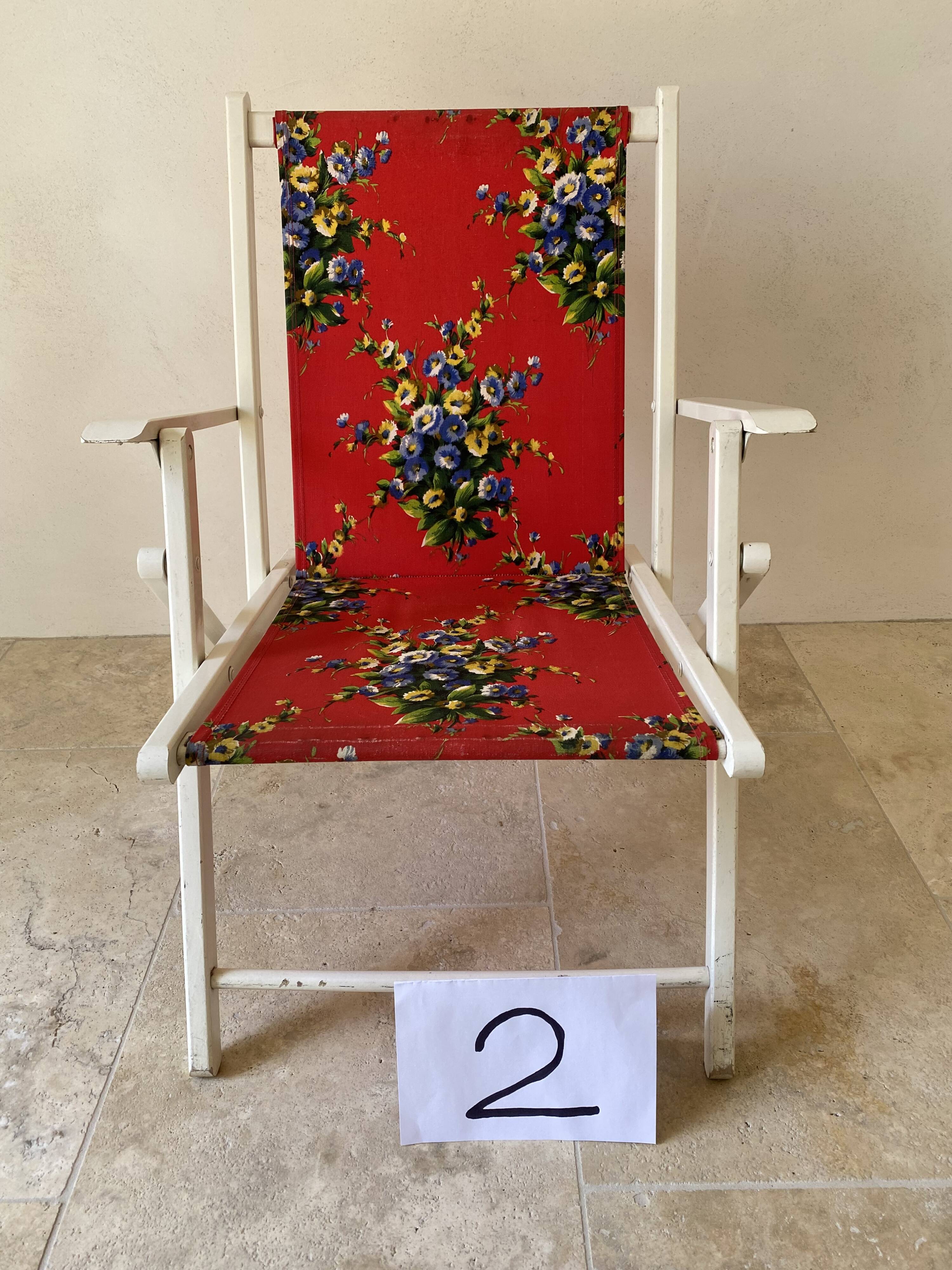 4 vintage garden chairs from the 70s with original floral fabric.