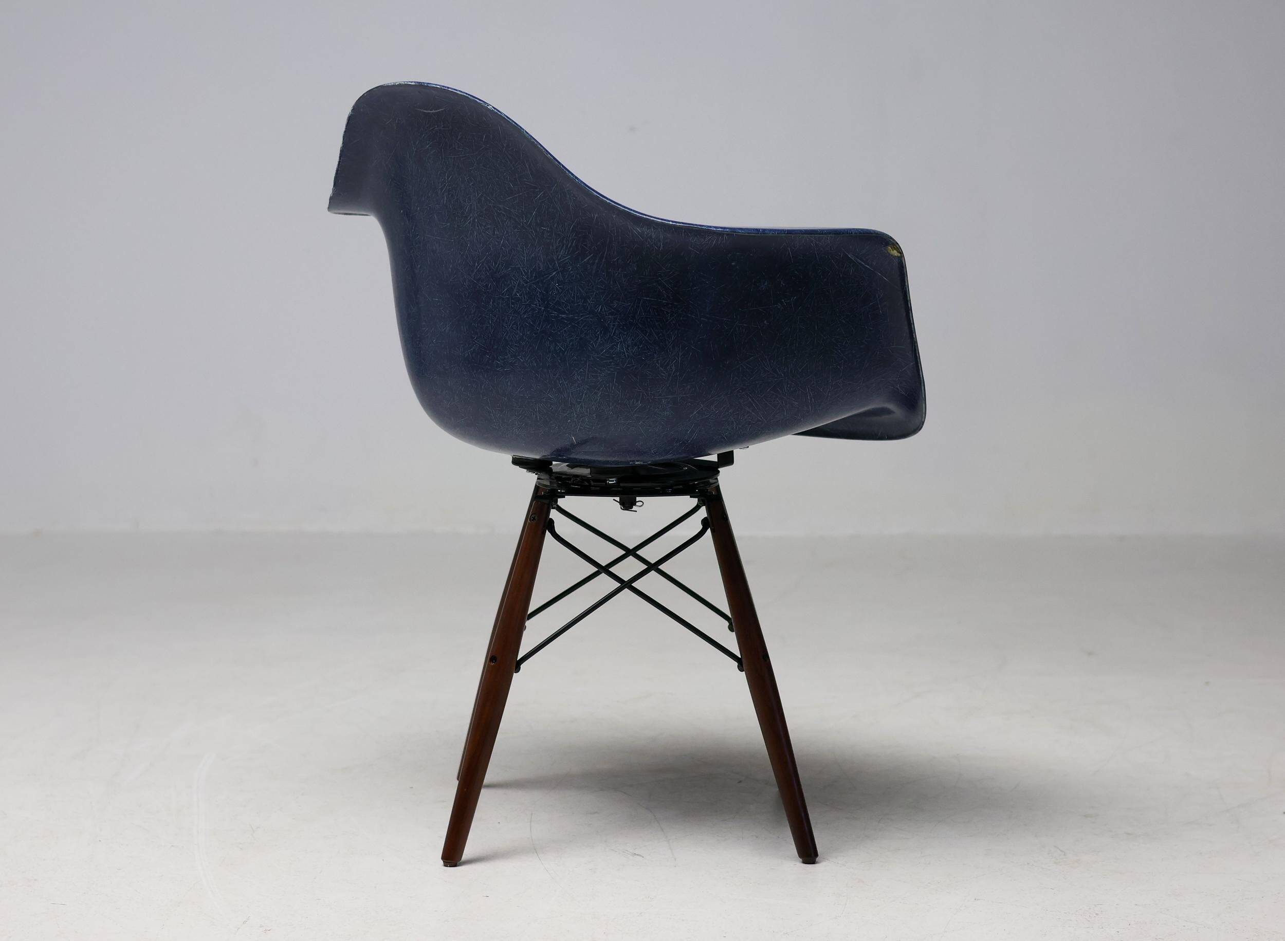 Indigo blue Charles Eames "PAW" armchair by Herman Miller, mid-century modern.