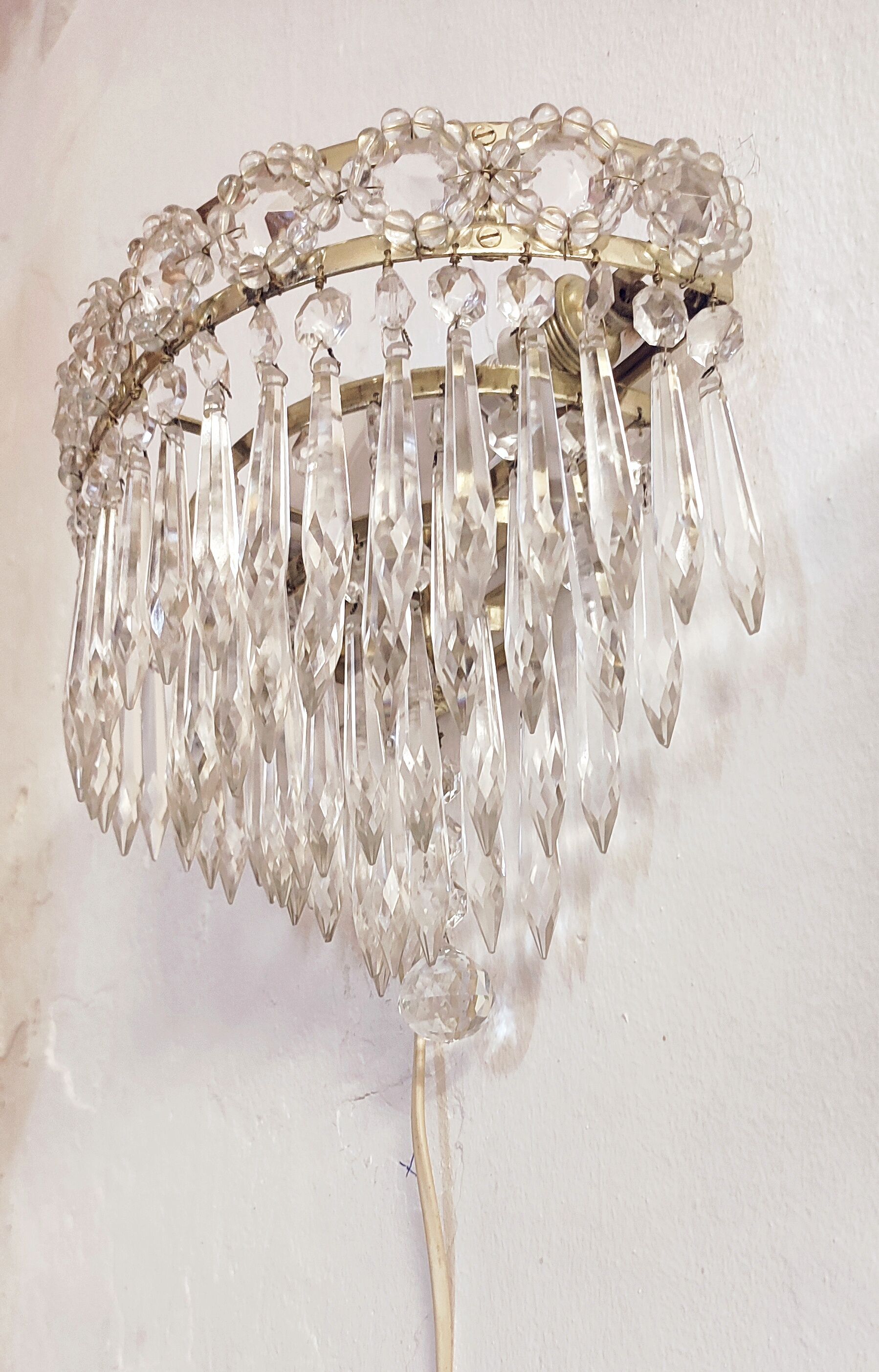 Classic crystal sconces. France, 1950s