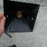 pair of wrought iron lanterns and granite glass