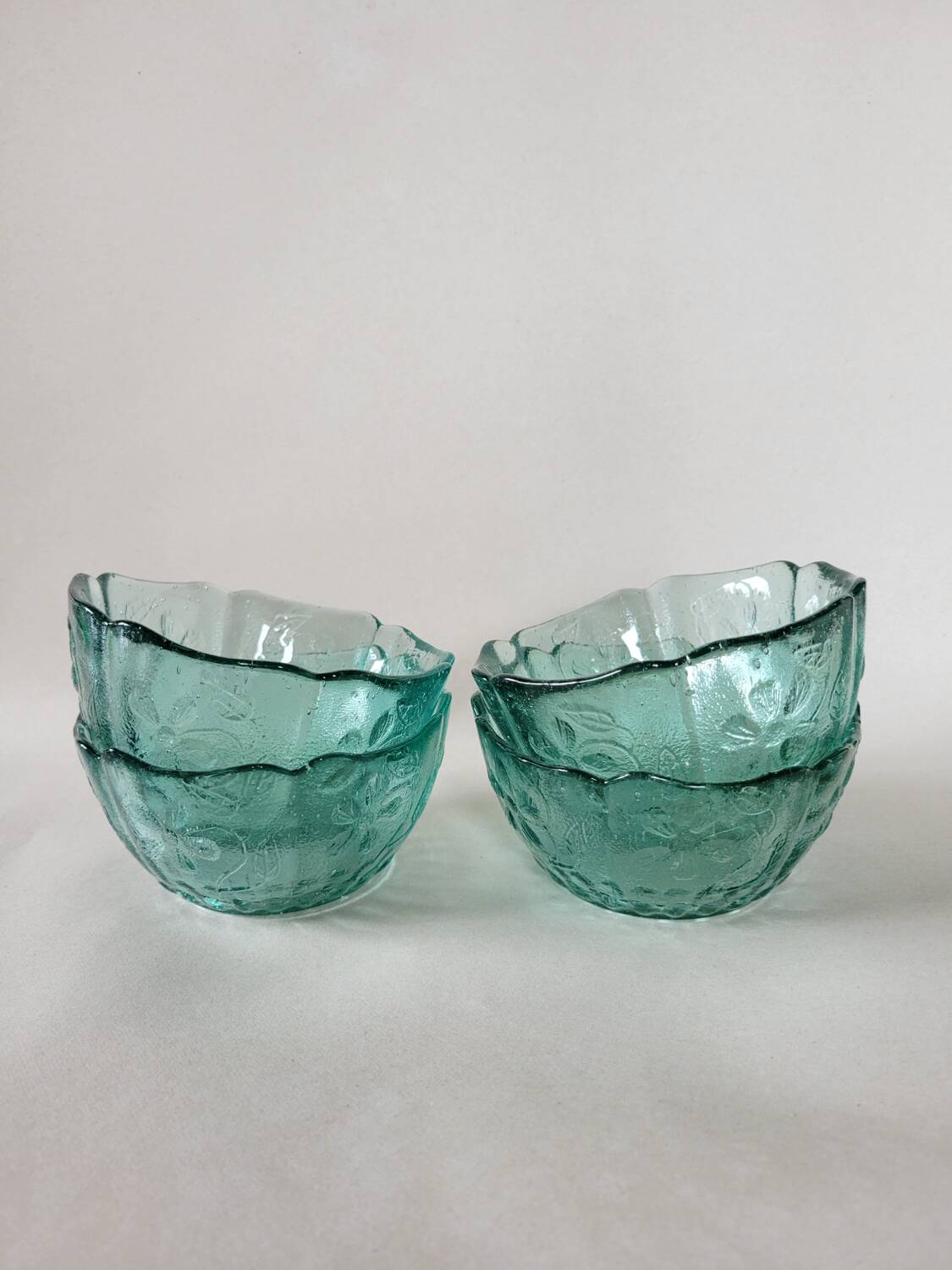 4 ramekins with embossed designs